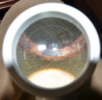 Ex donut y pipe side under magnifying glass.jpg