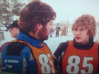 Father (Roy) Son (Kris) talking about how the sled was running out on the track after a race.jpg