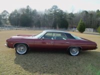 maroon-1972-chevrolet-impala-four-door-sedan-with-vinyl-top-1.jpg