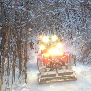 One JD tractor and Two Groomers clearing the North 10 Trail in Antrim County Michigan after the big New Years Snow of 2012. 10 miles in 8 hours.