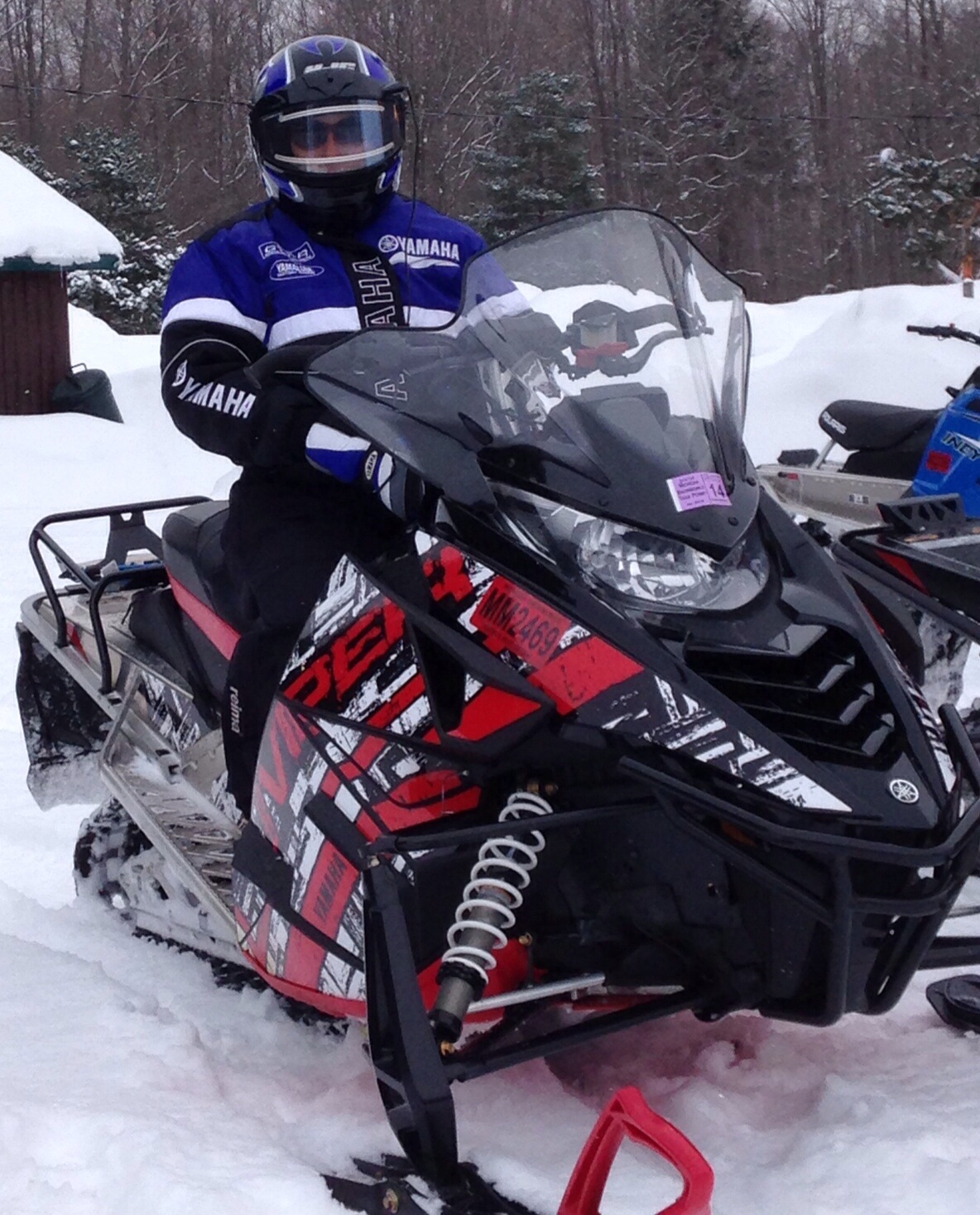 2014 Viper LTX Wrapped, with wife aboard.  She loves her LTX.  Her first ride she thought it had power steering.  My brother loves the instant throttle response and the ski lift up to 40 MPH!  Sitting at Larry's on 131 & M 32 along trail 76.