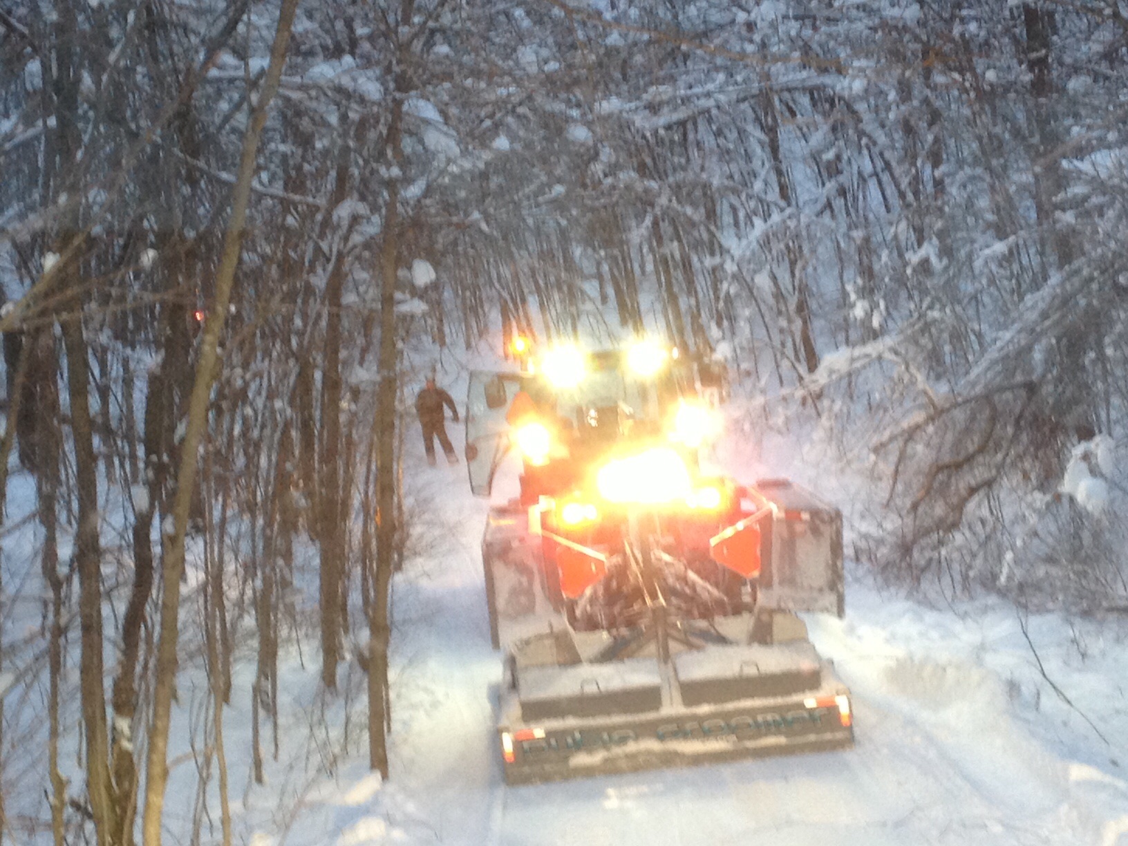 One JD tractor and Two Groomers clearing the North 10 Trail in Antrim County Michigan after the big New Years Snow of 2012. 10 miles in 8 hours.